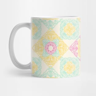 Pink, yellow and turquoise granny squares over cream Mug